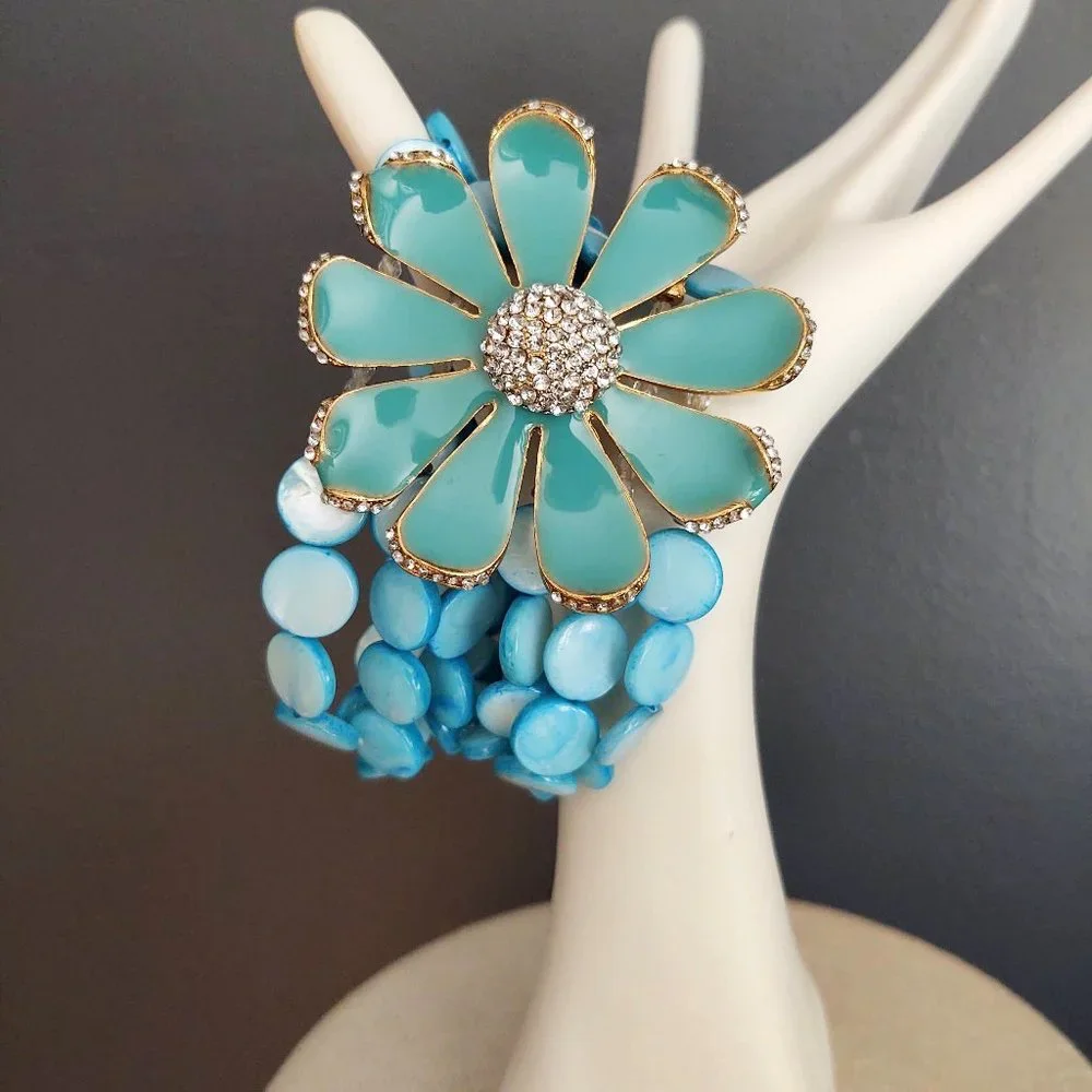 Dyed shell stretch bracelet w/enamel flower& cz's